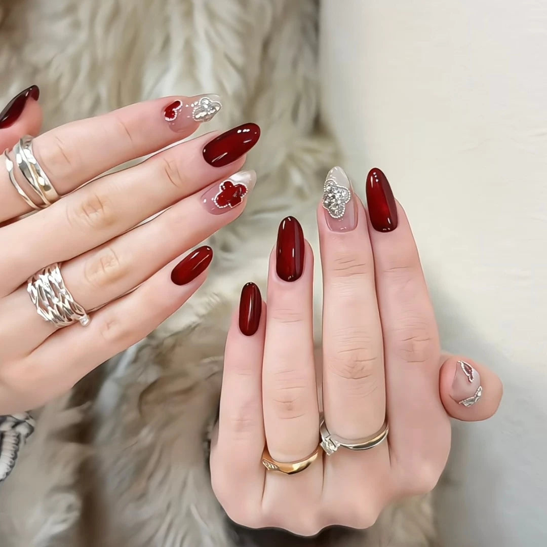 Four-leaf clover-themed red and white handmade nail art