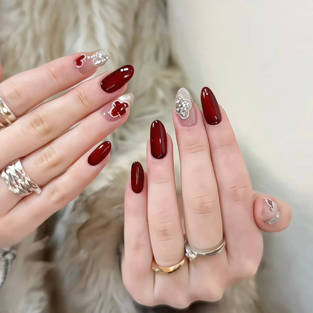 Four-leaf clover-themed red and white handmade nail art